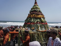 Javanese people carry an offerings during the ritual ceremony of labuhan 1st Suro (Javanese calendar) during the Islamic New Year celebratio...