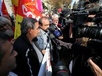 Philippe Martinez (C), Secretary General of the General Confederation of Labour attends a national demonstration against the French governme...