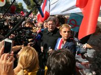 Jean Luc Melenchon (C), member of the national assembly addresses people at a rally in Paris, France on September 21, 2017 gathered to oppos...