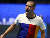 Mikhail Youzhny of Russia reacts during the St. Petersburg Open ATP tennis tournament match in St. Petersburg, Russia, Thursday, Sept. 21, 2...