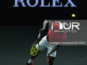 Team World player Frances Tiafoe of United States returns the ball to Team Europe player Marin Cilic of Croatia during the first day at Lave...