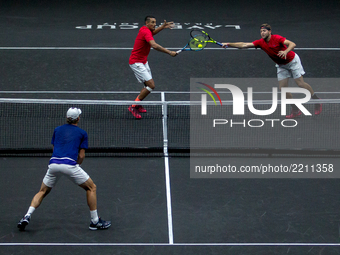 Jack Sock of Team World hits a volley playing with Nick Kyrgios during there doubles match against Tomas Berdych and Rafael Nadal of Team Eu...