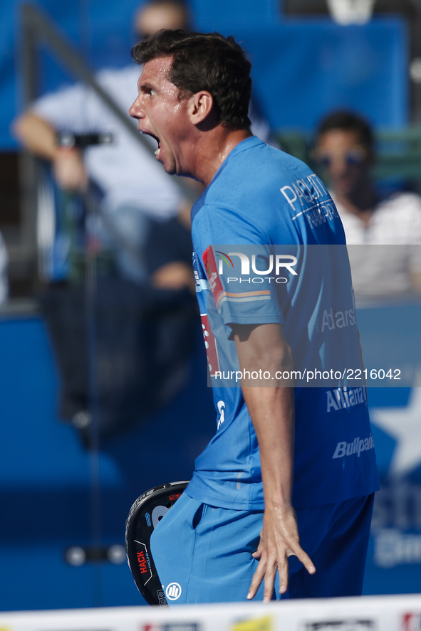 Francisco Navarro of Spain celebrates a point while looking towards doubles partner Carlos Gutierrez of Argentina during the Portugal Master...