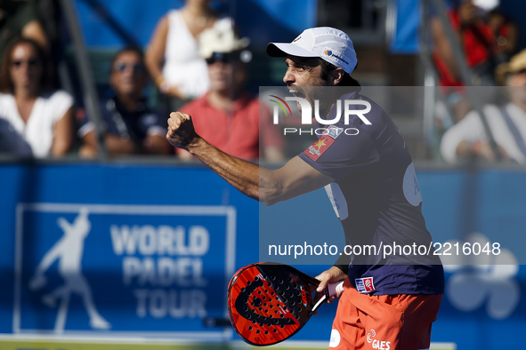 Fernando Belasteguin of Argentina celebrates a point while looking towards doubles partner Pablo Lima of Brasil during the Portugal Masters...