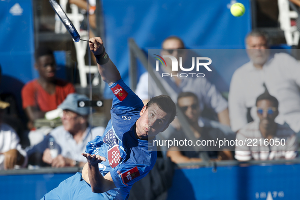 Francisco Navarro of Spain hits a backhand playing with Carlos Gutierrez of Argentina during the Portugal Masters Padel 2017 men's doubles f...