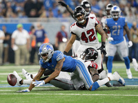 Detroit Lions wide receiver Marvin Jones (11) attempts to catch a pass as he is being tackled by Atlanta Falcons cornerback Robert Alford (2...