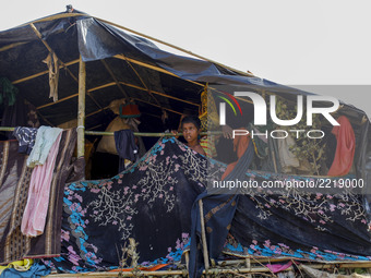 A Rohingya refugee boy in front of his makeshift tent at Thankhali refugee camp in Teknaf, cox’s Bazar 25 September 2017. According to UN mo...