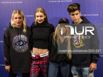 BARCELONA, SPAIN - SEPTEMBER 26: Influencers with Gigi Hadid during an event at Barcelona Passeig de Gracia Tommy Hilfiger. From right to le...