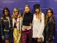 BARCELONA, SPAIN - SEPTEMBER 26: Influencers with Gigi Hadid during an event at Barcelona Passeig de Gracia Tommy Hilfiger. From right to le...