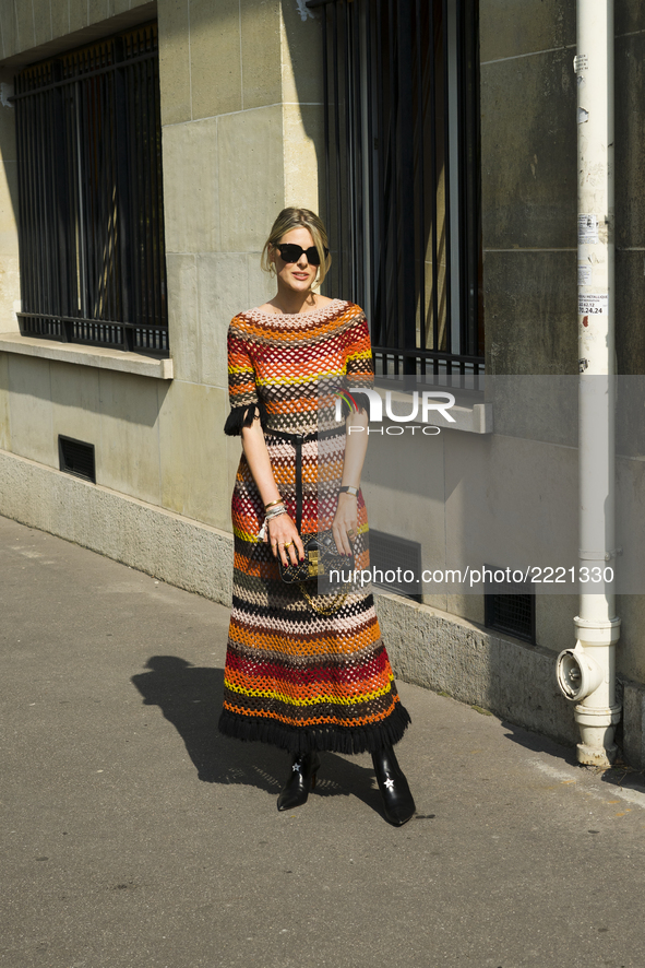 Sofie Valkiers is wearing a striped dress seen outside Dior during Paris Fashion Week Spring/Summer 2018 on September 26, 2017 in Paris, Fra...