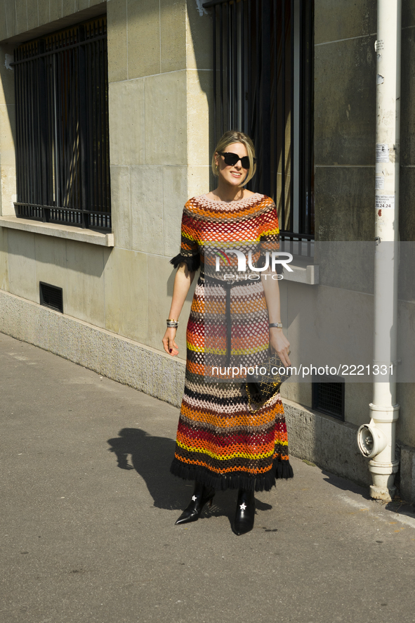Sofie Valkiers is wearing a striped dress seen outside Dior during Paris Fashion Week Spring/Summer 2018 on September 26, 2017 in Paris, Fra...