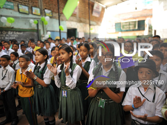 Students of Green Peace Co-Ed School welcoming by clapping their hands towards Formal Living Goddess Kumari MATINA SHAKYA in a school with h...