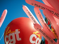 Condoms read 'For XXL rights'. More than 15000 protesters took to the streets of Toulouse against the new Macron's reforms on the Work Code....