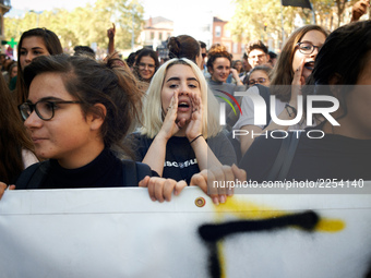 A student shout slogans. More than 15000 protesters took to the streets of Toulouse against the new Macron's reforms on the Work Code. It's...