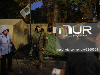 Protesters, who participat large-scale rally in Kyiv to demand  immediate political reforms,  set up a tent camp in front of Ukrainian Parli...