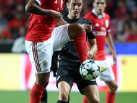 Benfica's Brazilian midfielder Filipe Augusto vies with Manchester United's Spanish midfielder Ander Herrera during the UEFA Champions Leagu...