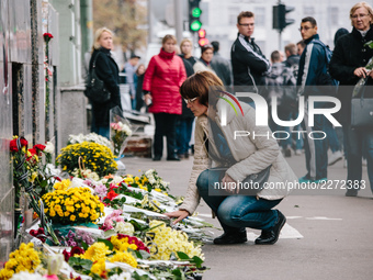 People at the improvised memorial in Kharkov, Ukraine on 19 October 2017 after a violent car accident on 18 October 2017 night. Five people...