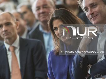 Virginia Raggi (C), Mayor of Rome, and Alejandro Agag, (R), CEO of Formula E Holdings Ltd., attend a press conference in Rome, Italy on Octo...