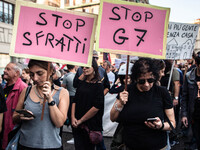 
Protesters march in Naples against the G7, on October 21, 2017 before the start the G7 summit of Interior Ministers with European Union re...