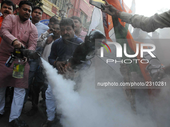 India's ruling political party BJP Yuba Morcha Supporters hold a Mosquito cart out and a demonstration in front of the Kolkata Municipal Cor...