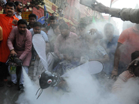 India's ruling political party BJP Yuba Morcha Supporters hold a Mosquito cart out and a demonstration in front of the Kolkata Municipal Cor...