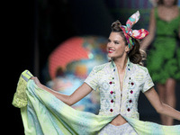 Model Alessandra Ambrosio showcases designs by Desigual on the runway at Desigual show during Mercedes Benz Fashion Week Madrid Spring/Summe...