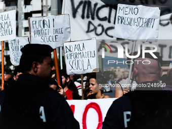 Workers gathered to protest over employment rights as Italian prime minister Matteo Renzi celebrates the inauguration of the academic year i...