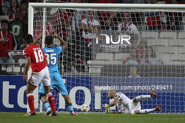 Benfica's goalkeeper Paulo Lopes (R) suffers the second goal scored by Zenit