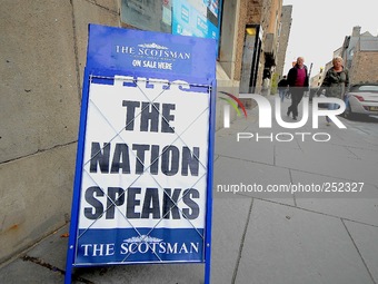 A giant headline from the Scotsman newspaper reads ' The Nation Speaks