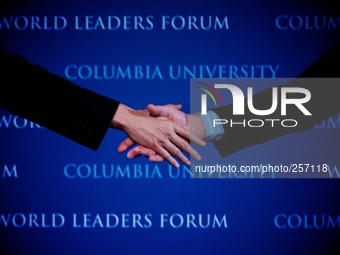 NEW YORK - Philippine President Benigno S. Aquino III (Left) shake hands with Columbia University President Lee C. Bollinger (Right) after c...