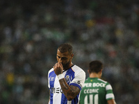Porto's forward Ricardo Quaresma (L) reacts during the Portuguese Liga football match Sporting CP vs FC Porto at Alvalade stadium in Lisbon...