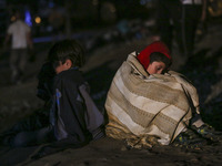 Refugees staying the night in Idomeni, Greece. The borderline between Greece-FYROM (Macedonia). Refugees from Syria, Iraq, Afghanistan and t...