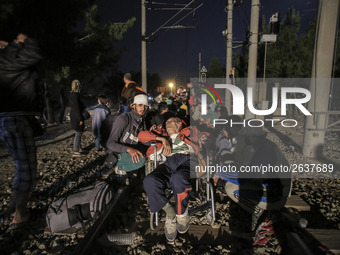 Refugees staying the night in Idomeni, Greece. The borderline between Greece-FYROM (Macedonia). Refugees from Syria, Iraq, Afghanistan and t...