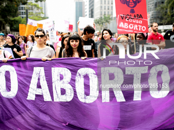 Protestors march in favor of the legalization of abortion in Sao Paulo, Brazil on Sept. 28, 2014. Abortion is considered a crime in Brazil,...