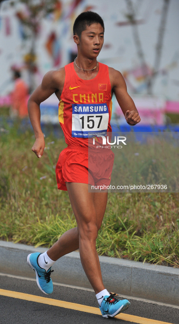 (141001) -- INCHEON, Oct. 01, 2014 () -- Zhang Lin of China competes during the men's 50km race walk of athletics at the 17th Asian Games in...