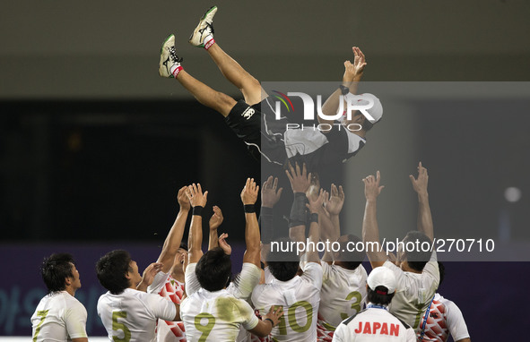 (141002) -- INCHEON, Oct. 2, 2014 () -- Players of Japan celebrate after the men's rugby final match against China's Hong Kong at the 17th A...