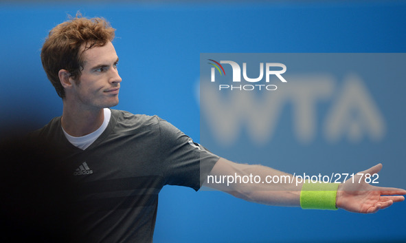 (141003) -- BEIJING, Oct. 3, 2014 () -- Andy Murray of Britain reacts during the men's quarterfinal match against Marin Cilic of Croatia at...