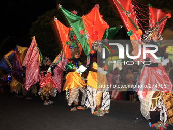 Indonesian Muslim parade in the streets with a torch, lamp and uses a unique costume themed tribute for Palestine to celebrate Eid al-Adha o...