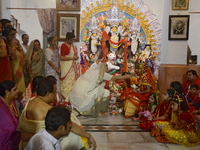 Members of aristocratic house (Banedi Bari) performing the rituals Kumari Puja , where unmarried young female children are being worshiped a...