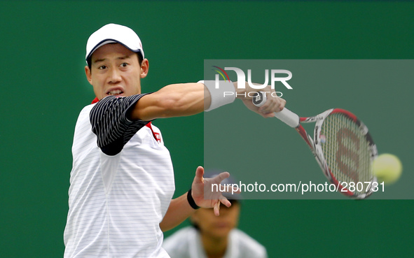 (141008) -- SHANGHAI, Oct. 8, 2014 () -- Kei Nishikori of Japan returns the ball during the men's singles second round match against Jack So...