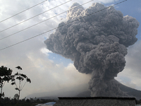 Mount Sinabung volcano with lava blowing a giant black cloud of volcanic ash after the latest eruption of Mount Sinabung in Karo District, S...