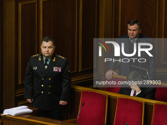 Ukraine's parliament on Tuesday confirmed National Guard chief Stepan Poltorak(center) as the former Soviet state's fourth defence minister...