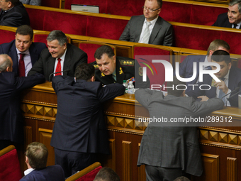 Deputies great National Guard chief Stepan Poltorak as he became a new defence minister of Ukraine. (
