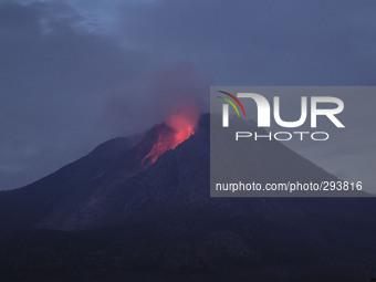 Hot Lava Volcanic spew from the Mount Sinabung seen from the Tiga Serangkai village, Simpang Empat Districk, Karo, North Sumatra. Indonesia....