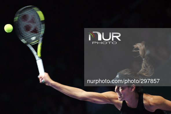 (141020) -- SINGAPORE, Oct. 20, 2014 () -- Serbia's Ana Ivanovic serves during the round robin match of the WTA Finals against Serena Willia...