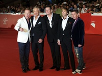 Members of Spandau Ballet pop band (from left) Martin Kemp, Gary Kemp, Tony Hadley, Steve Norman and John Keeble, pose on the red carpet as...