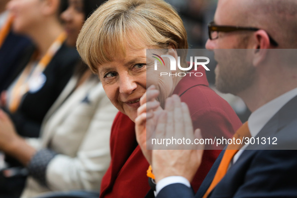 Christian Democratic Union (CDU) party's secretary general Peter Tauber and German Chancellor Angela Merkel attend a Integration Conference...