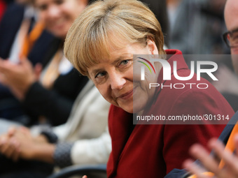 Christian Democratic Union (CDU) party's secretary general Peter Tauber and German Chancellor Angela Merkel attend a Integration Conference...