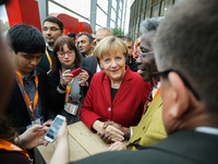 Chancellor Angela Merkel signed autographs in the crowd during a Integration Conference at the CDU-Party central on October 22, 2014 in Berl...