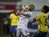Dynamo Moscow's midfielder Matthieu Valbuena (L) vies with Estoril's defender Anderson Luis during the UEFA Europa League football match bet...